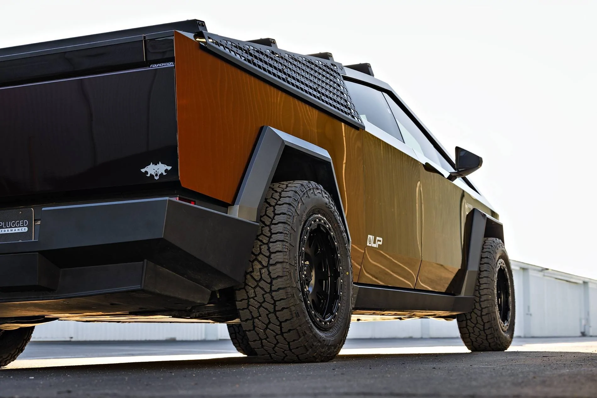 Tesla Cybertruck Customer Highlight - Assassin Red Cybertruck Build Tesla Cybertruck Assassin Red Wrap 20 inch Beadlock UP-03 Forged Wheels Roof Rails MOLLE Pan