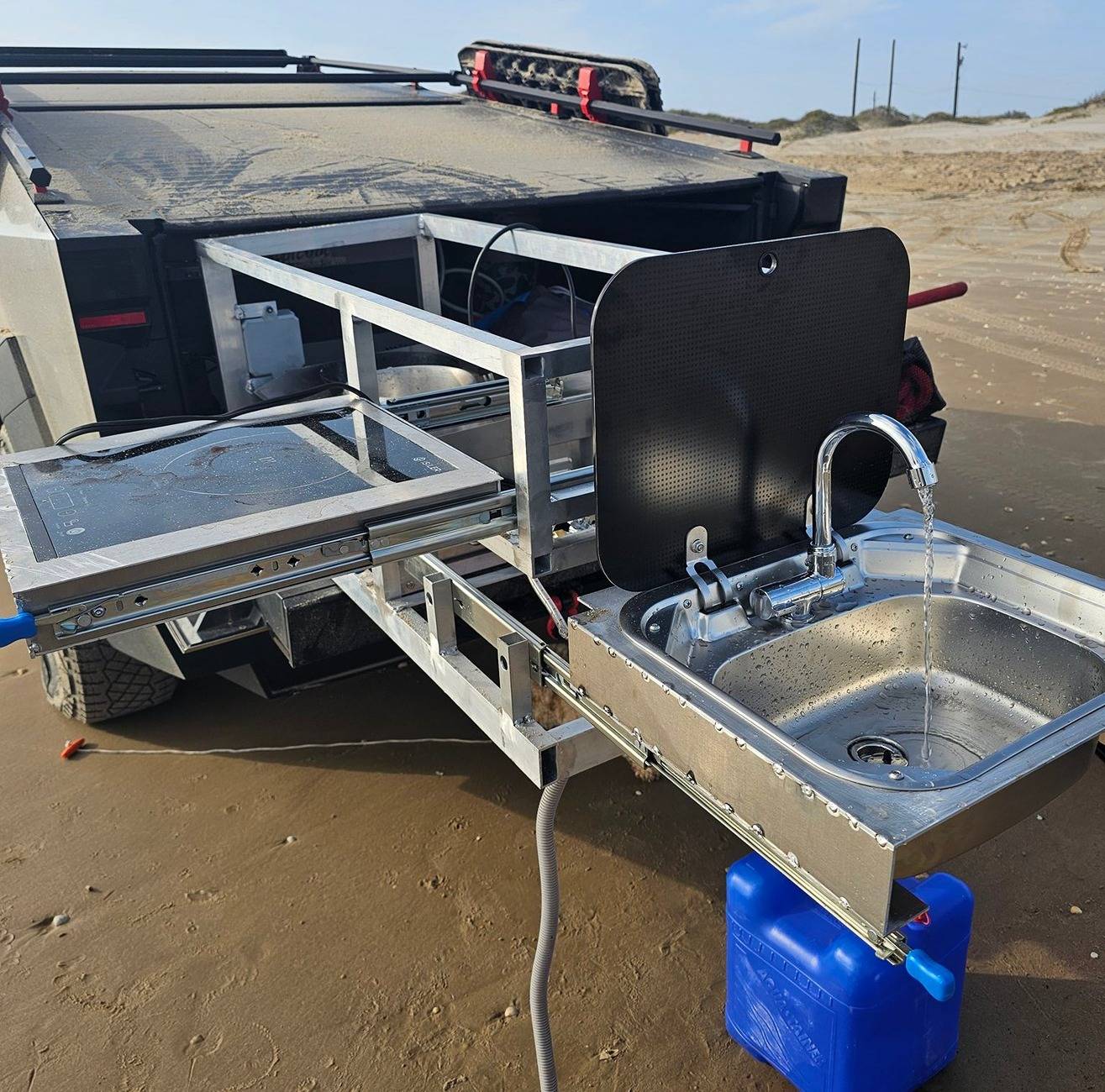 Tesla Cybertruck Custom Cybertruck camp kitchen with grill and sink GcuRSh6W8AAeY1