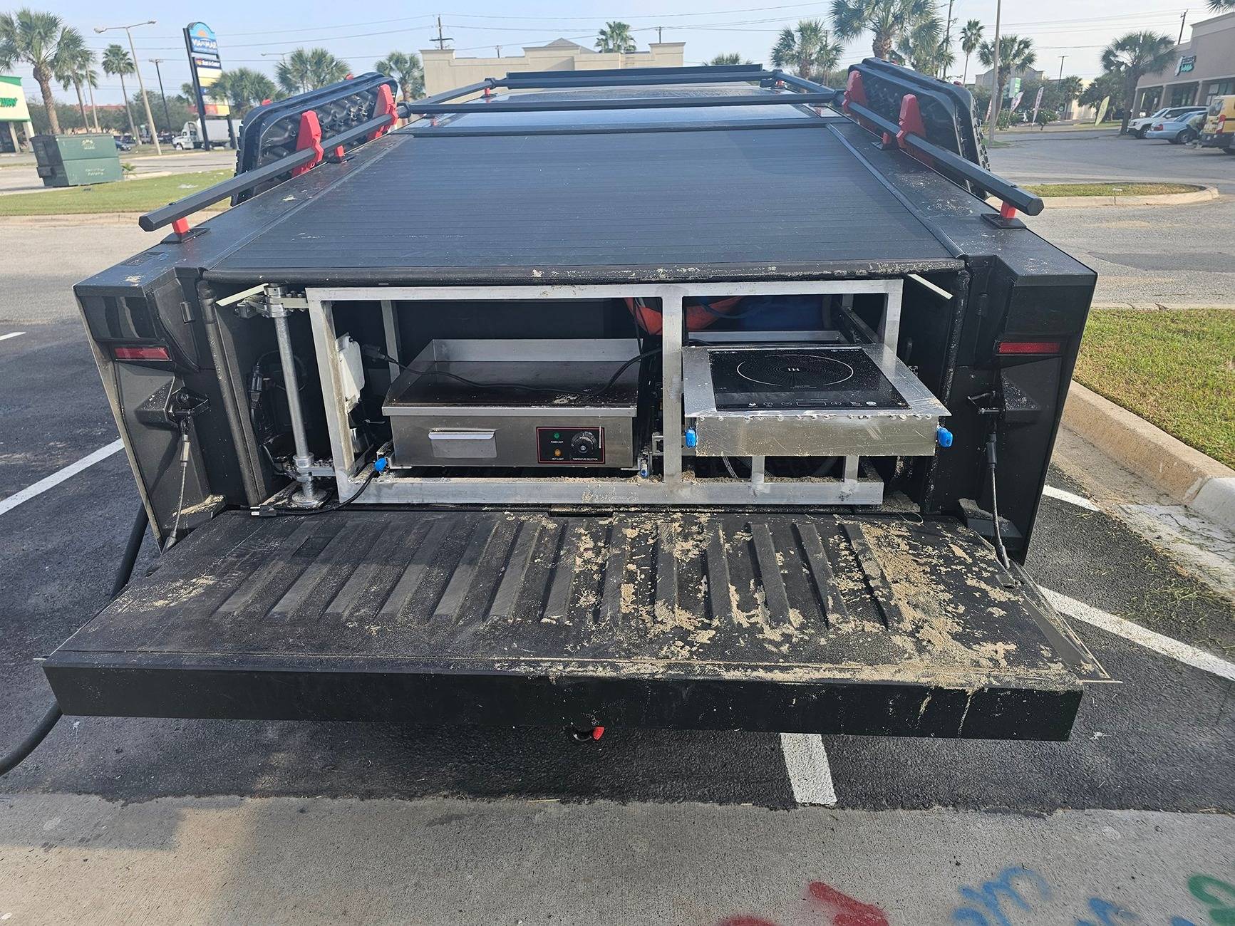 Tesla Cybertruck Custom Cybertruck camp kitchen with grill and sink GcwuMqJWEAAvYKb