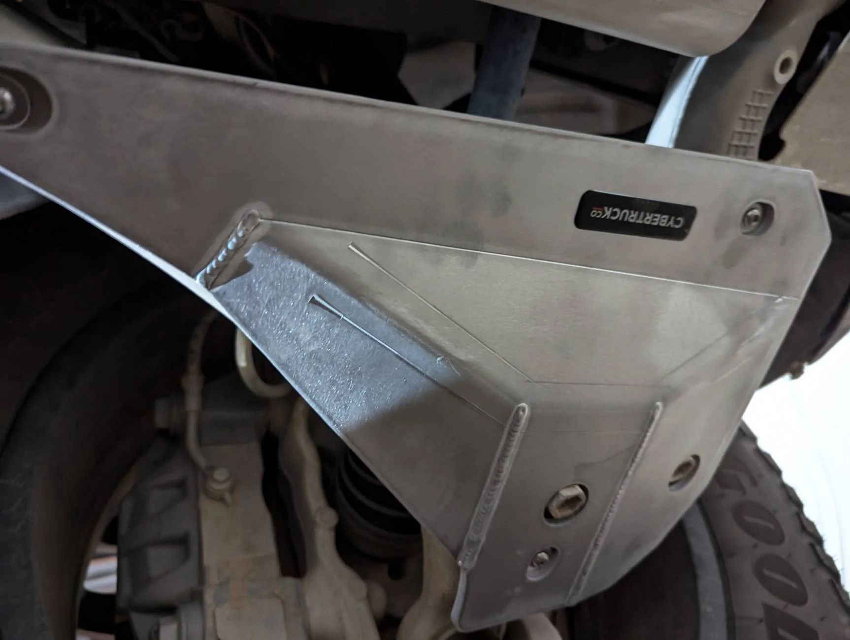Tesla Cybertruck Review: CybertruckCo front control arm armor PXL_20241122_013935629