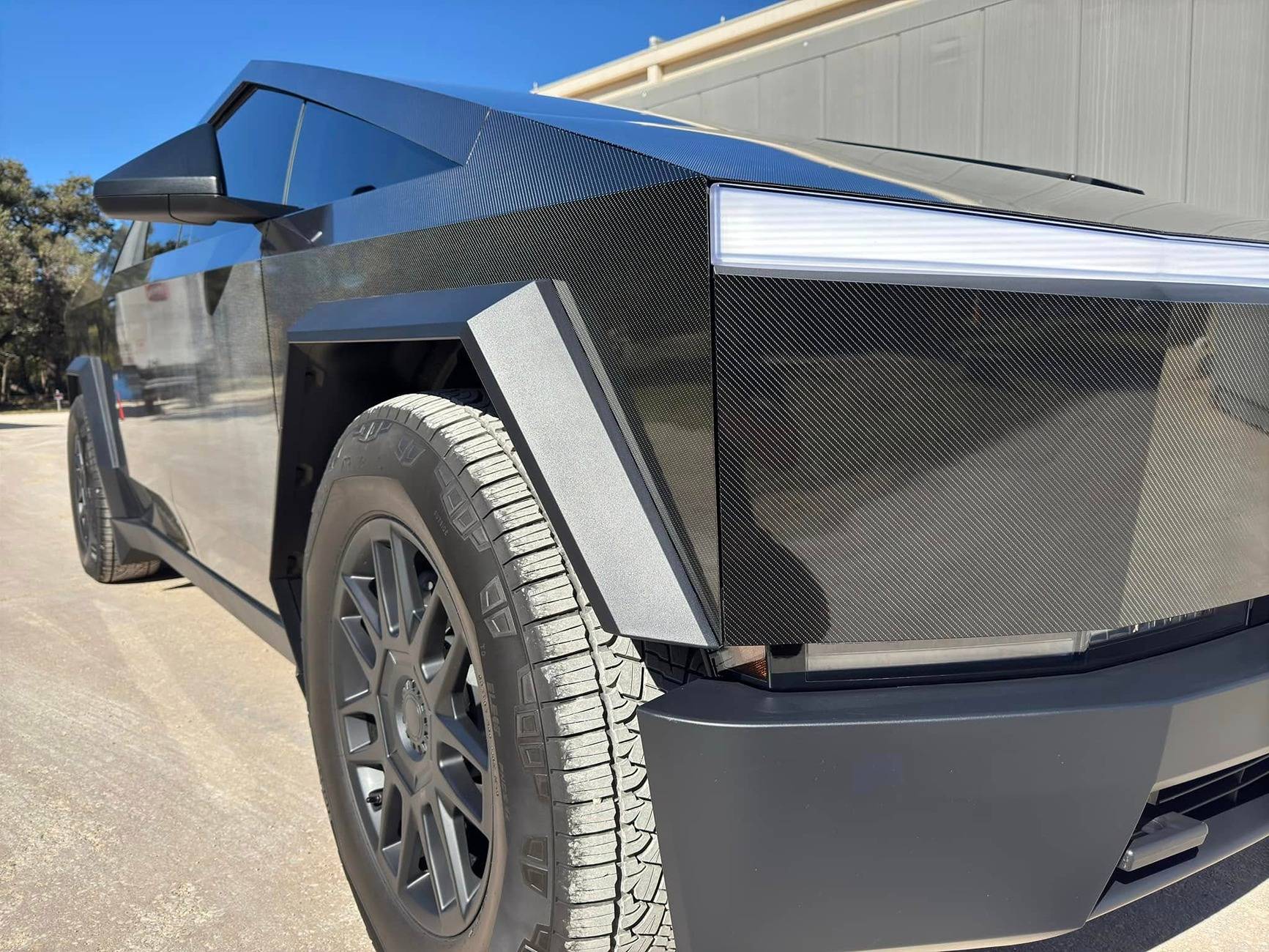Tesla Cybertruck Stek DYNO Carbon-Gloss and Stek DYNO Gray PPF wraps on Cybertruck Stek DYNO Carbon-Gloss PPF 2