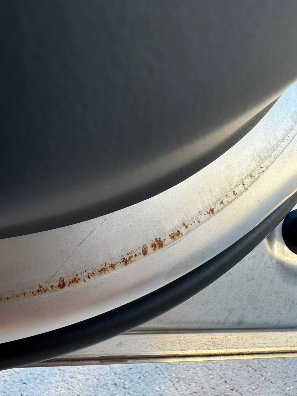 Tesla Cybertruck Rust on both inside front doors after 5 months. IMG_7765