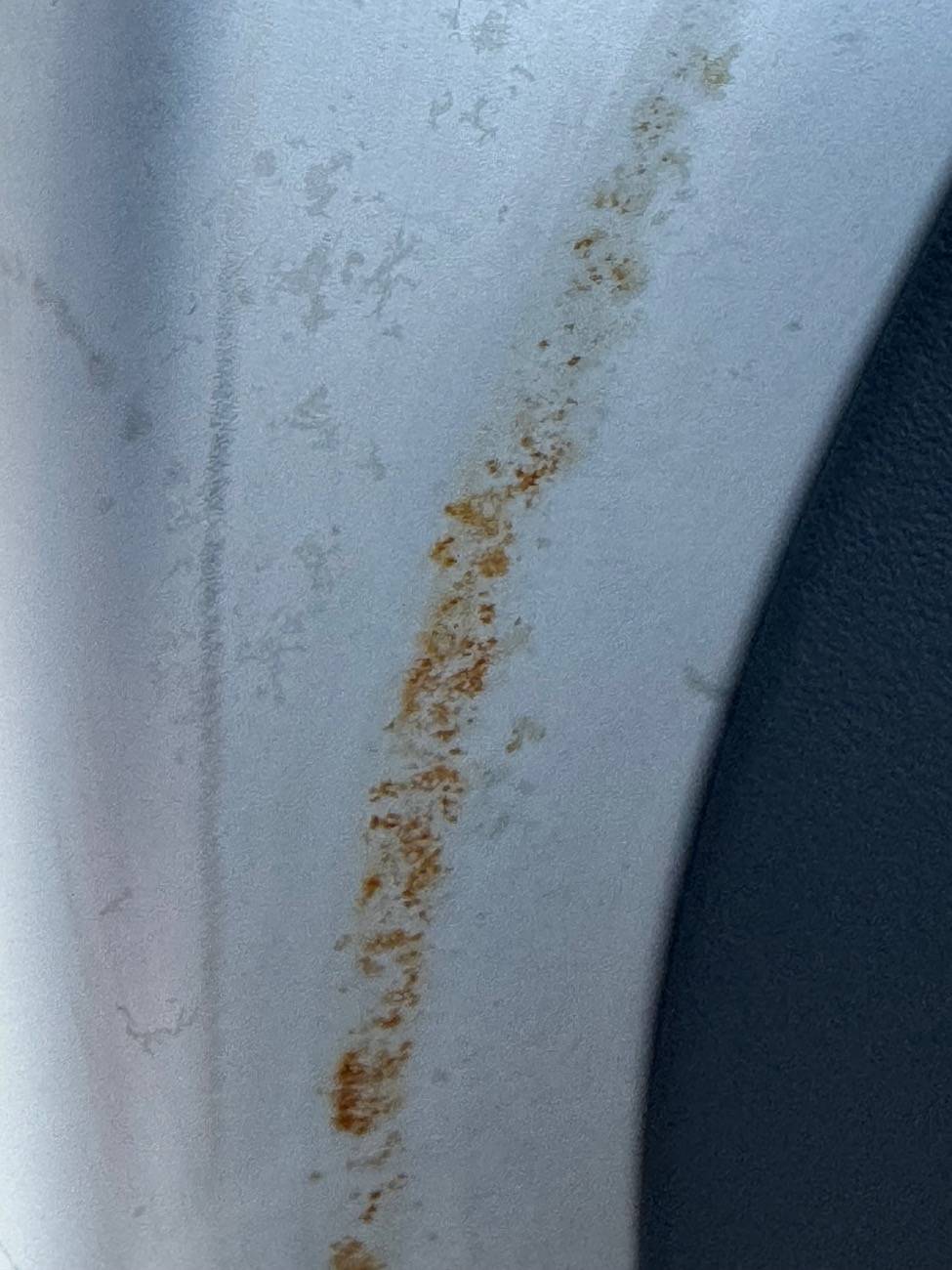 Tesla Cybertruck Rust on both inside front doors after 5 months. IMG_7760