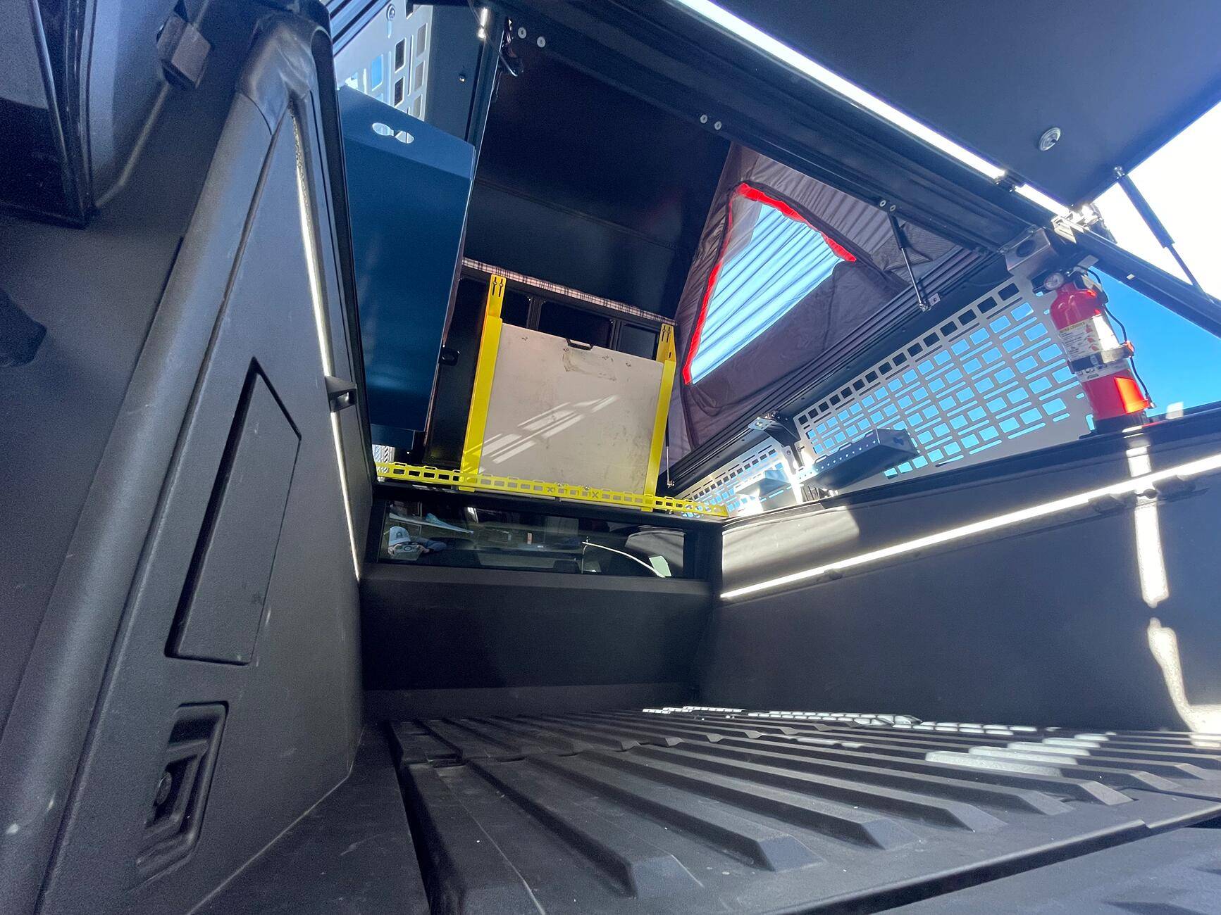 Tesla Cybertruck CYBERTRUCKco CyberCamper build on display at LA Auto show this weekend!, let us know what you think! tempImageIbcQ6V