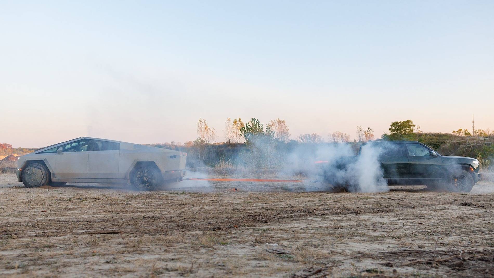 Tesla Cybertruck Tug-of-War battle: 2025 R1T Tri Max vs. 2024 Cybertruck CyberBeast Tri-Motor (Motortrend) 015-tugofwar-cyberbeast-vs-r1t-toty-2025