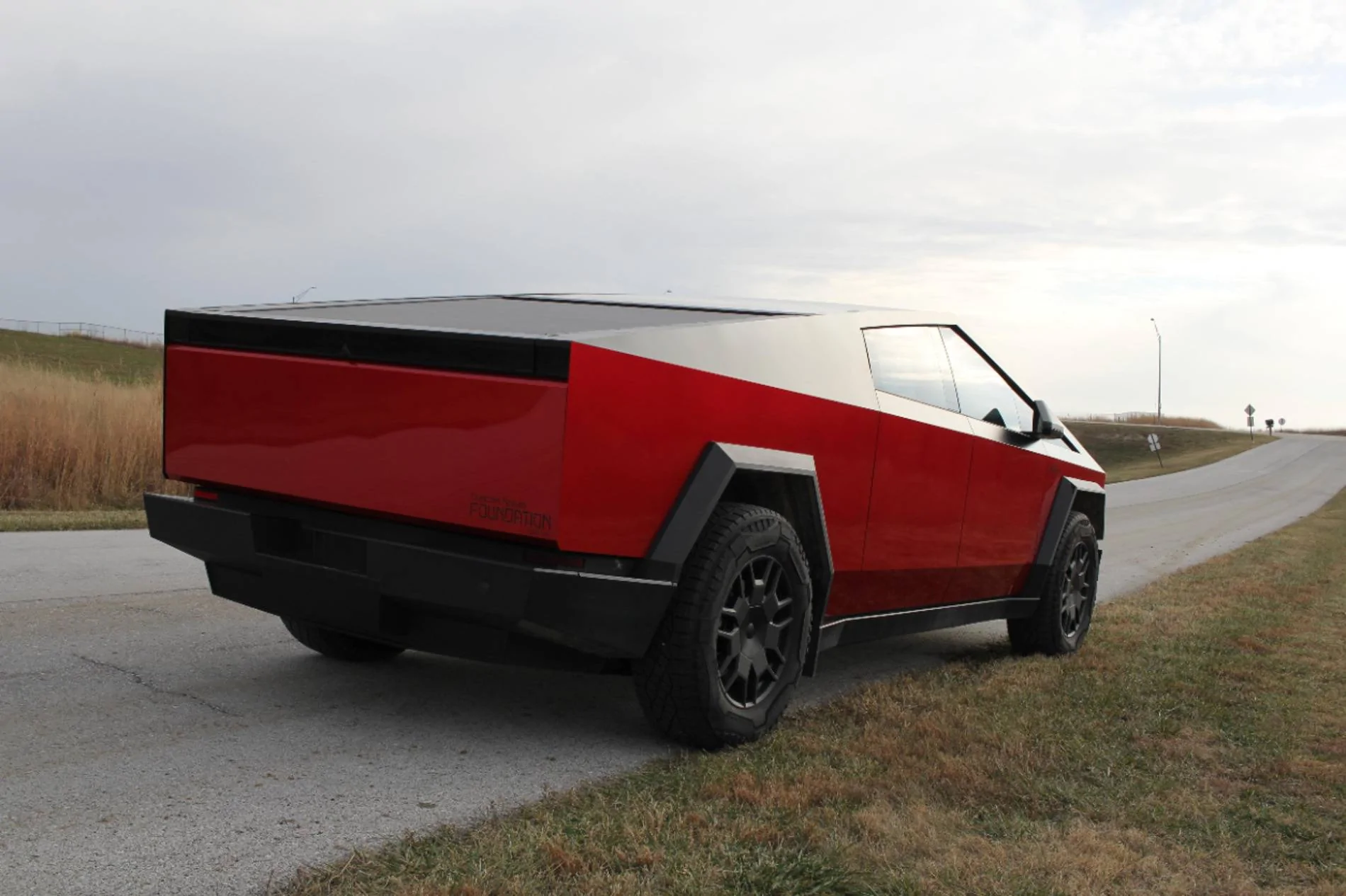 Tesla Cybertruck Two tone True Blood wrap with Satin Black IMG_0841