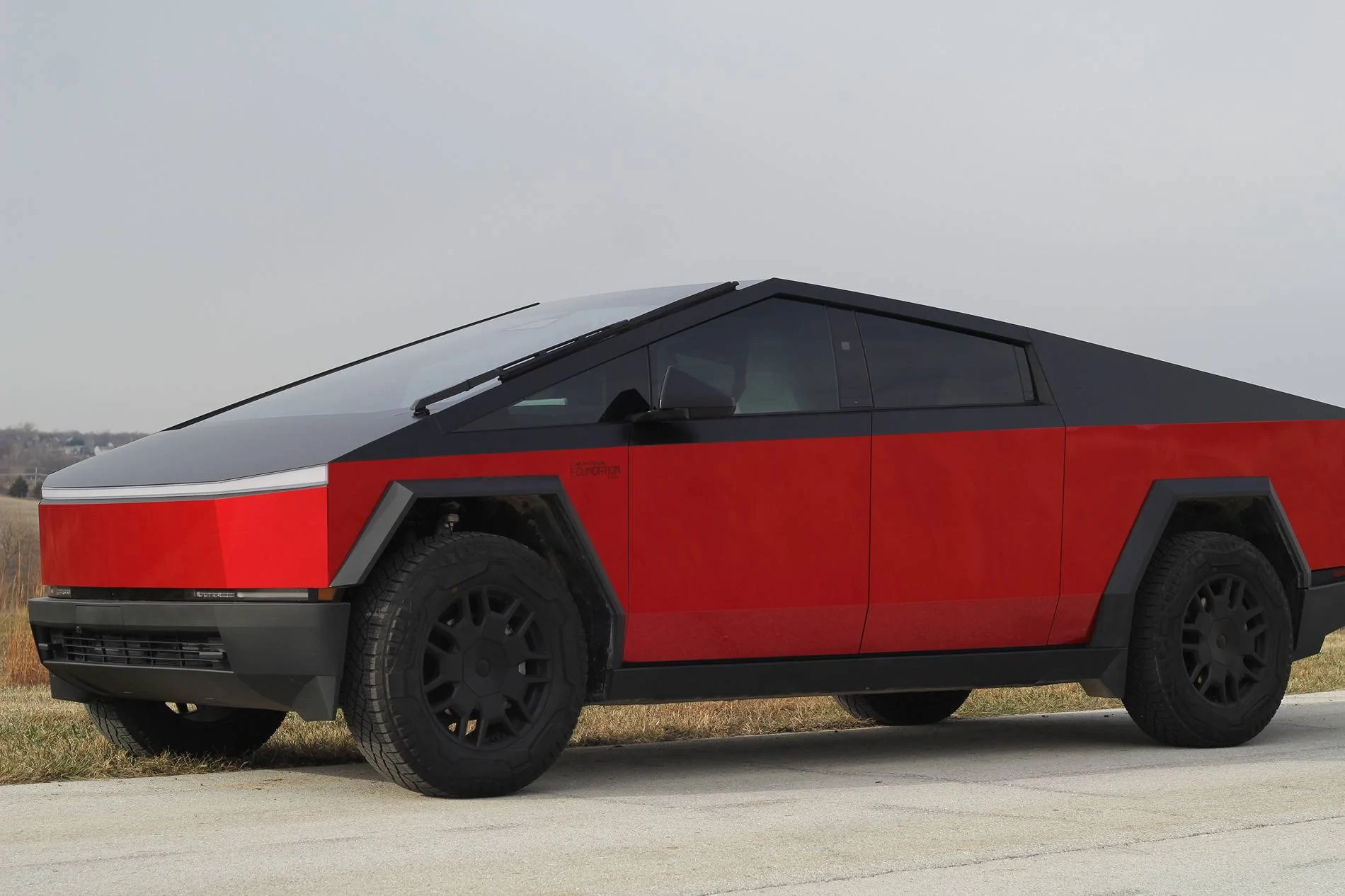 Tesla Cybertruck Two tone True Blood wrap with Satin Black IMG_0827