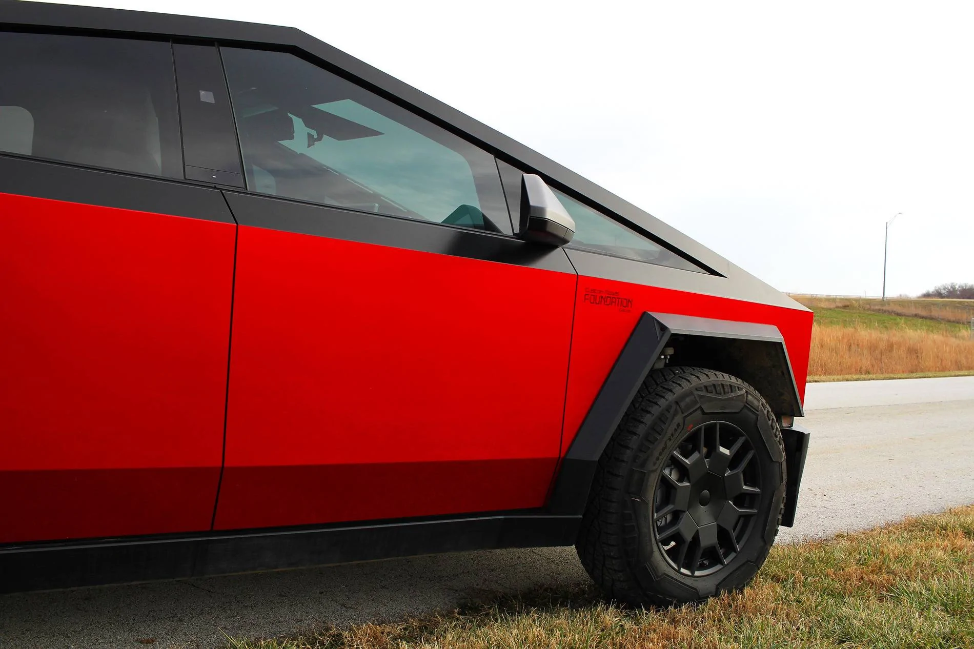 Tesla Cybertruck Two tone True Blood wrap with Satin Black IMG_0839
