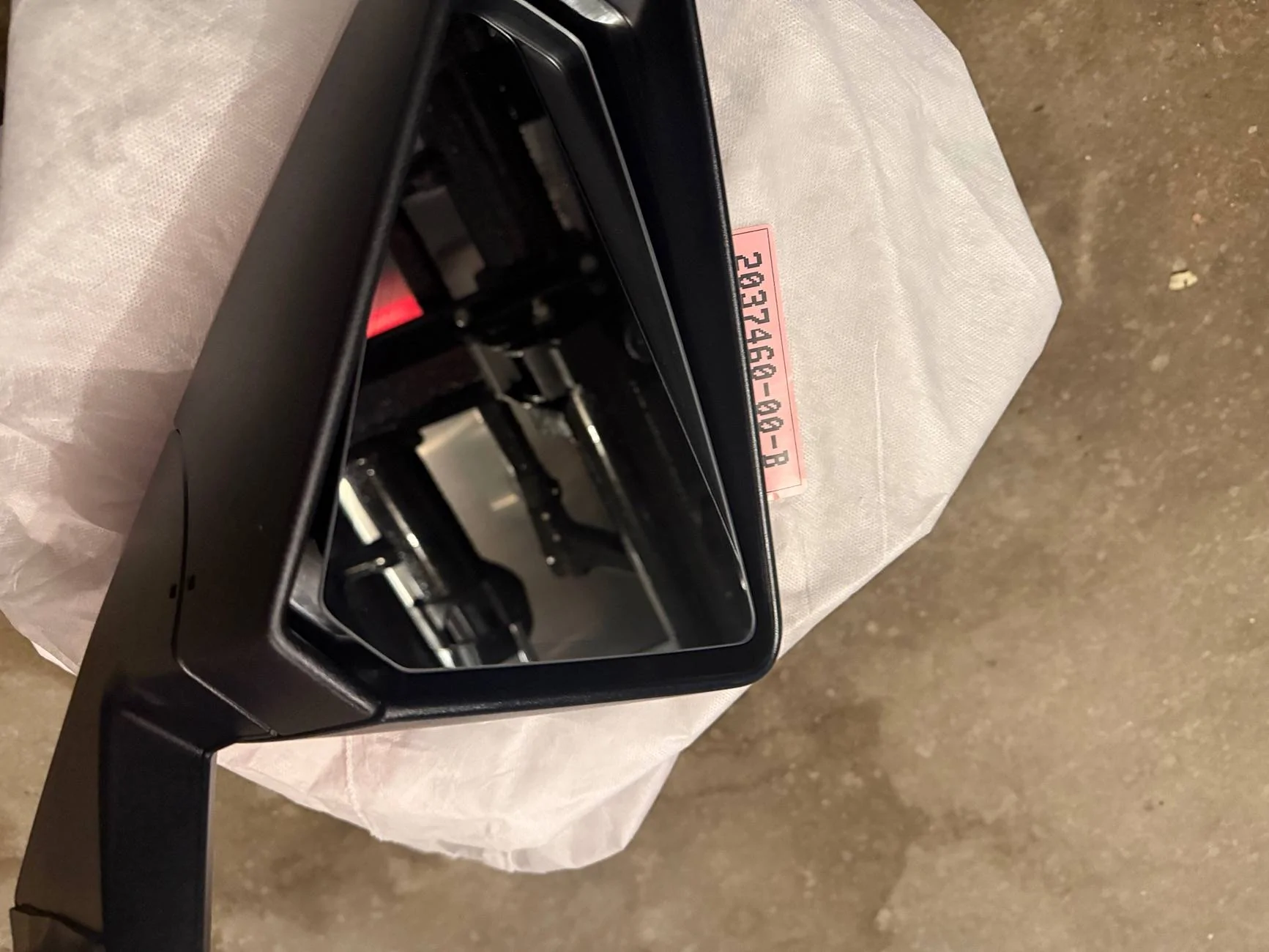 Tesla Cybertruck Cybertruck side mirror vs Garage Door. How much to fix side mirror? IMG_3207