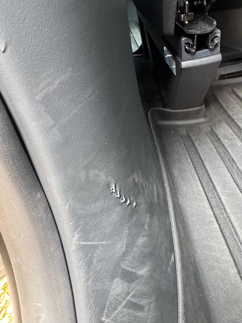 Tesla Cybertruck Interior damage - staples marks IMG_4648
