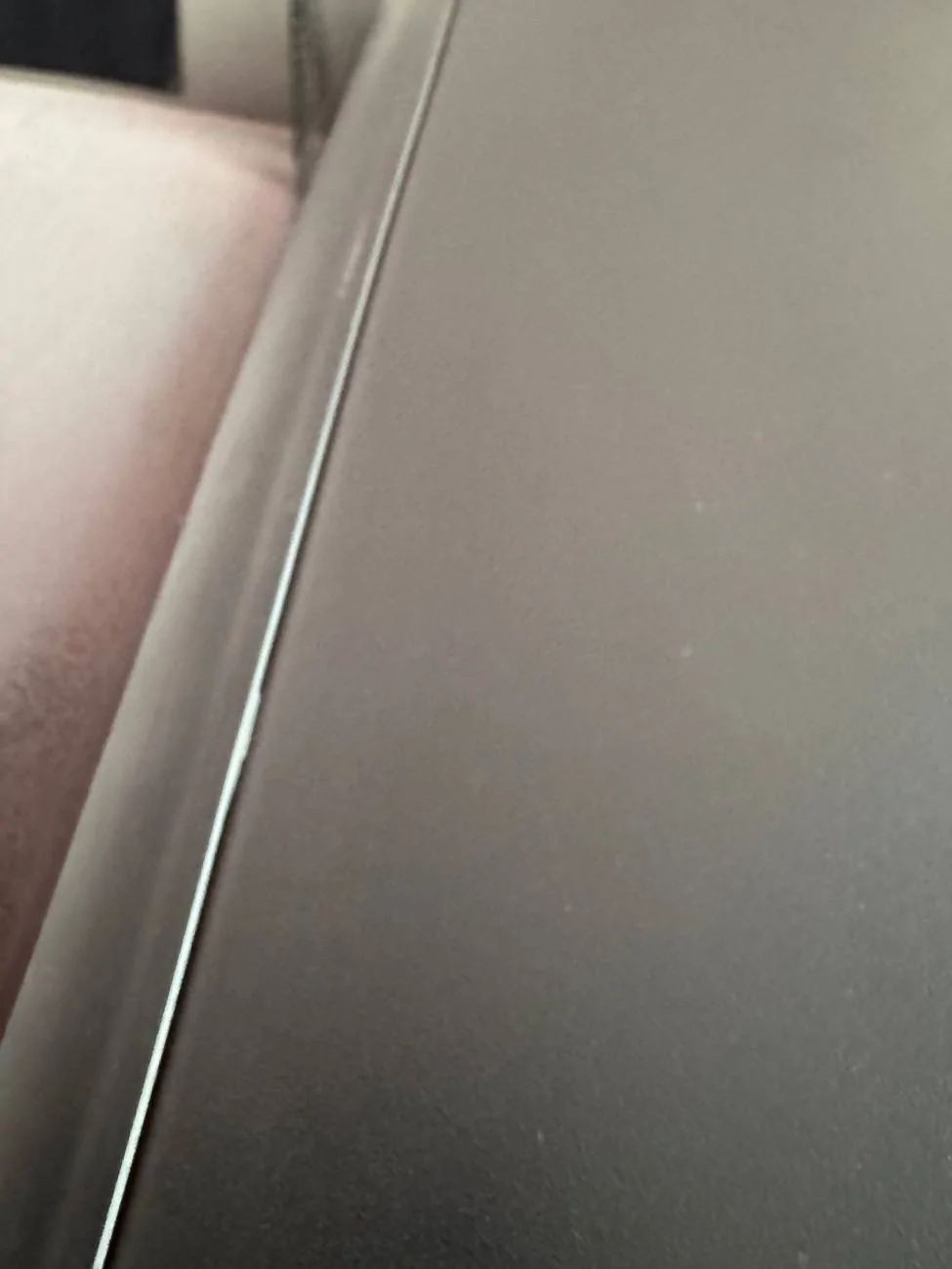 Tesla Cybertruck Please help - Can not remove Tonneau Applique (Could it be due to CyberTent install?) IMG_1270