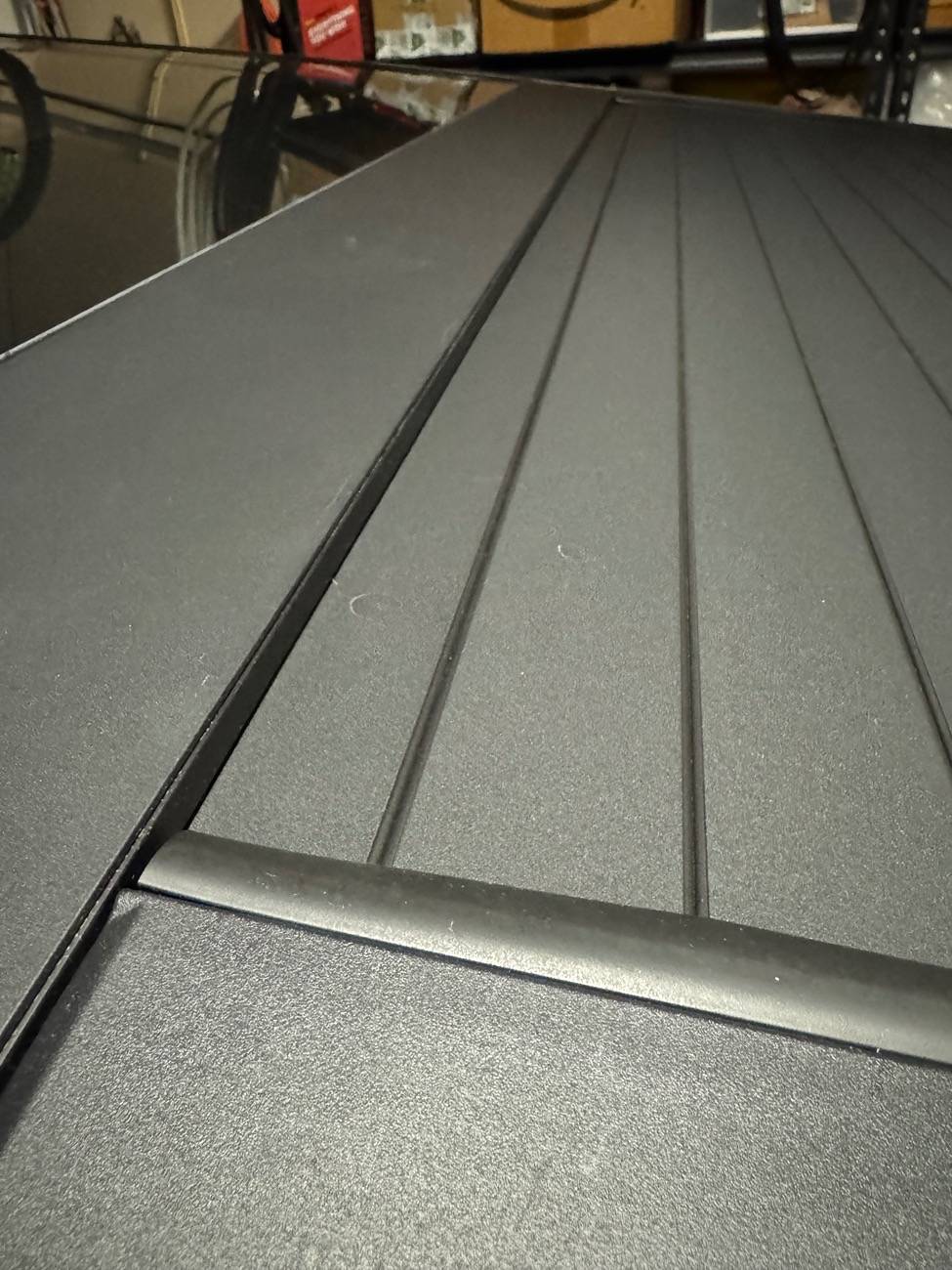 Tesla Cybertruck Tonneau cover leak DIY fix (cause: seal strip gap under aero flap) IMG_2866