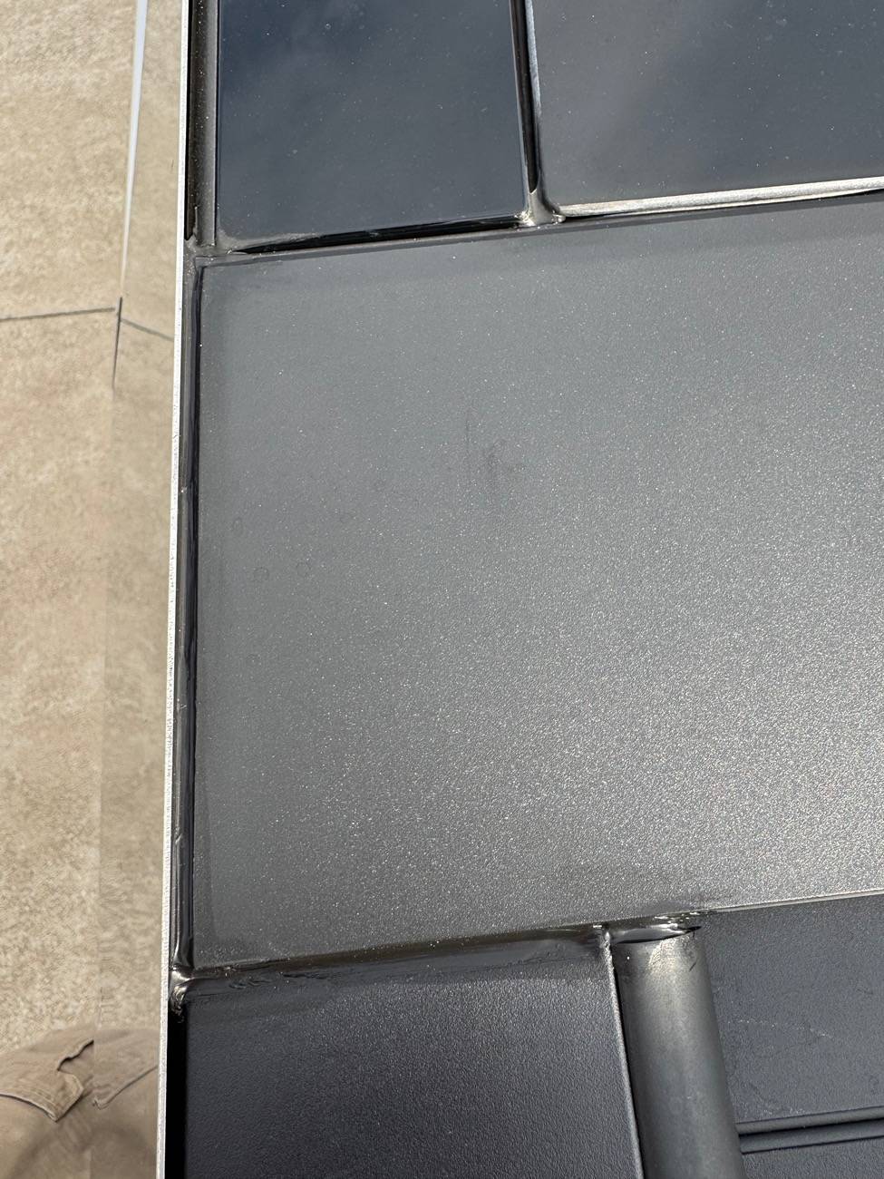 Tesla Cybertruck Tonneau cover leak DIY fix (cause: seal strip gap under aero flap) IMG_2933