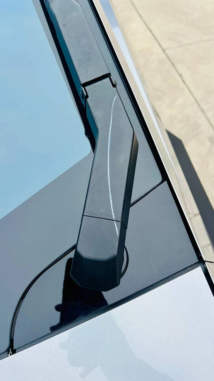 Tesla Cybertruck (Upland, CA) Marking on Delivered Cybertruck's Windshield Wiper Housing IMG_6548