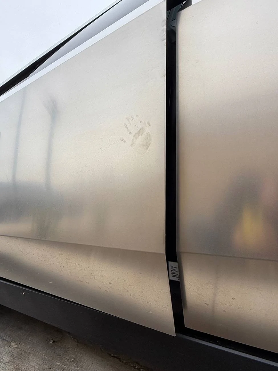 Tesla Cybertruck On Fingerprints. This one is my favorite “daddy come play with me” IMG_0346