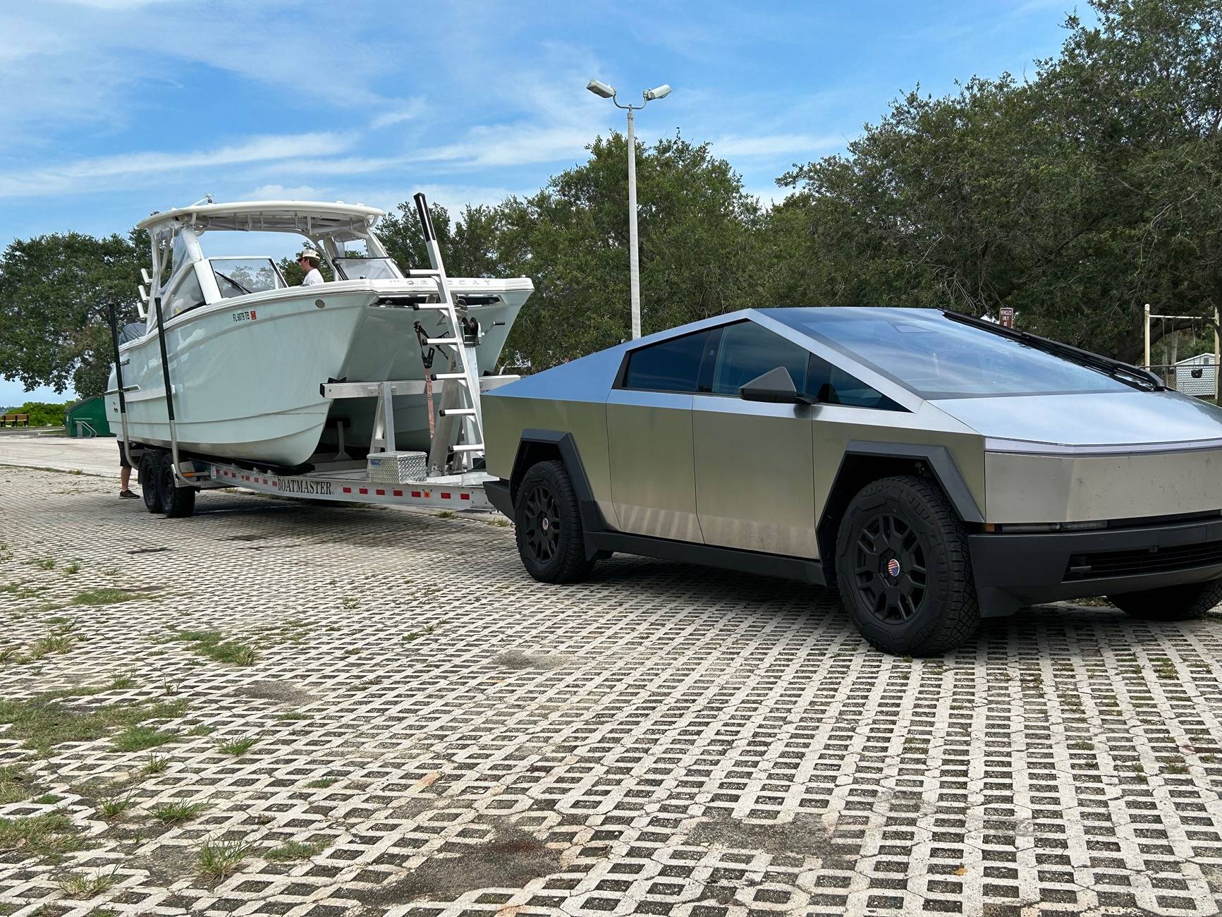 Tesla Cybertruck Towing a 15k lbs boat (30' CC tri axle) = no problem IMG_8390
