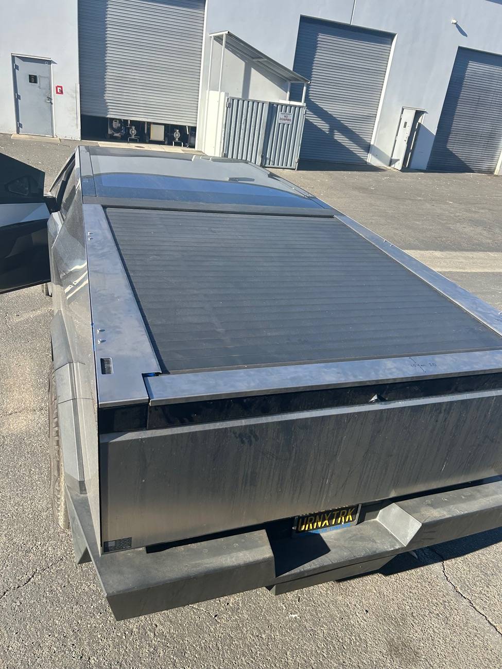 Tesla Cybertruck Stainless tailgate cap and sail panels IMG_5115