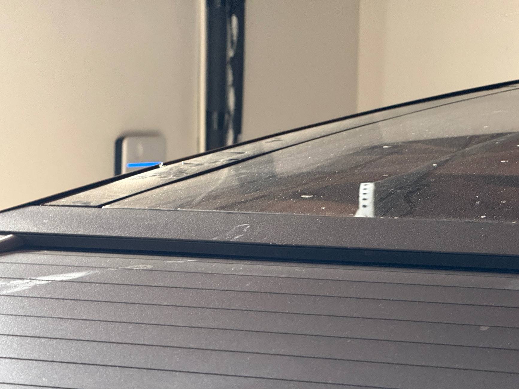 Tesla Cybertruck Roof trim coming loose. IMG_2447
