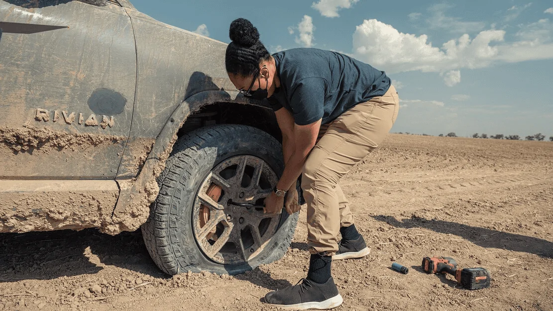 Tesla Cybertruck MotorTrend: 2022 Rivian R1T Spare Tire Explained: Fixing Flats Just Got Easier 1630966873772