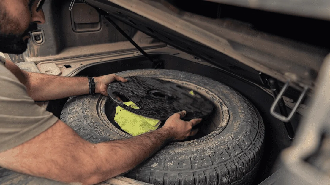 Tesla Cybertruck MotorTrend: 2022 Rivian R1T Spare Tire Explained: Fixing Flats Just Got Easier 1630966947810