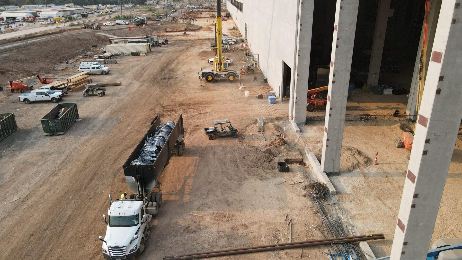 Tesla Cybertruck Tesla Model Y body castings begin to stack up at Giga Texas tesla-model-y-casting-scaled