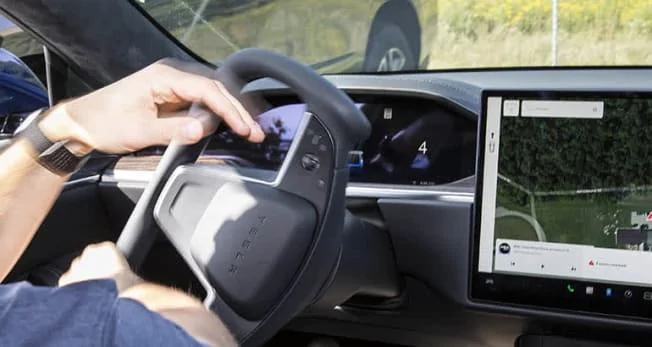 Tesla Cybertruck Consumer Reports: Tesla's New Steering Yoke Shows Little Benefit and Potential Safety Pitfalls R-Cars-Inline-2021-Tesla-Model-S-Yoke-Parking-9-21