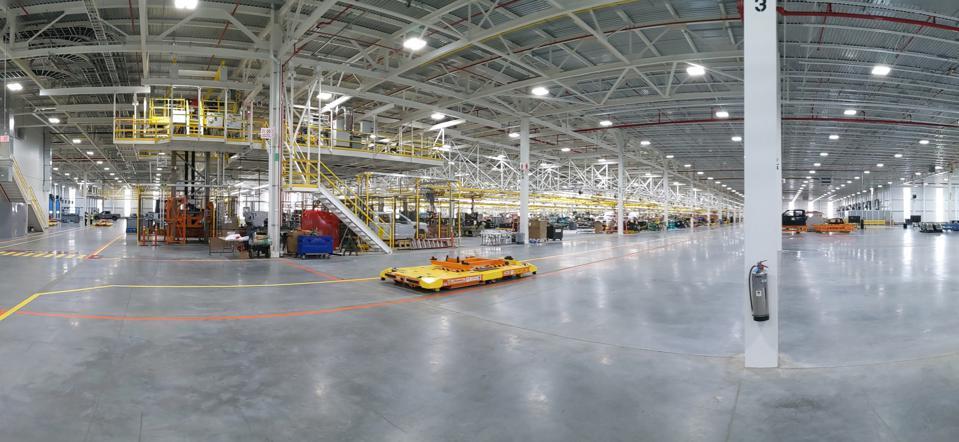Tesla Cybertruck Rivian Starts shipping to Customer https---specials-images.forbesimg.com-imageserve-6143996ea87f3e196eb910a5-Ford-s-Rouge-Electr