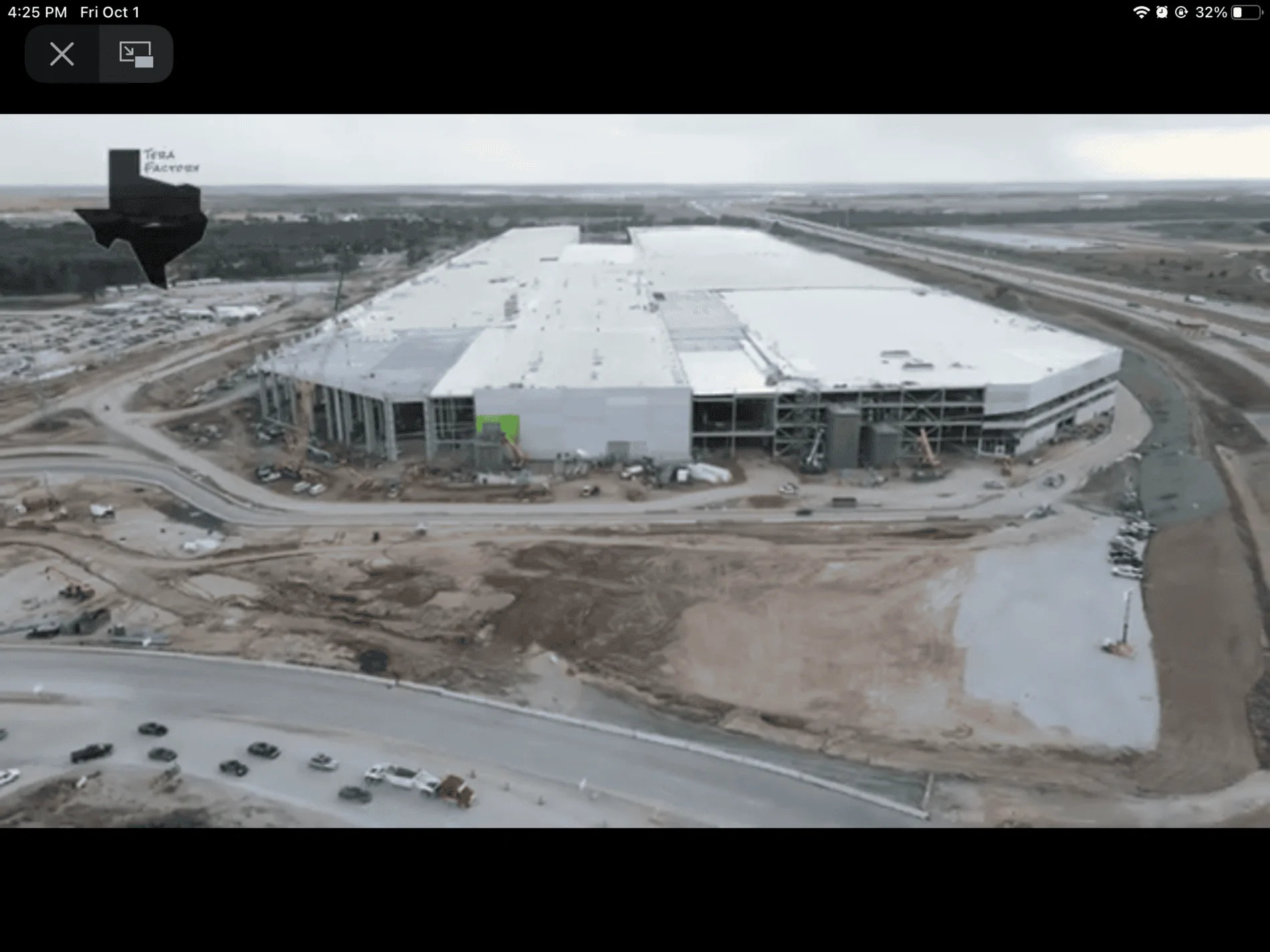 Tesla Cybertruck Giant Cybertruck silhouette starting to appear on GigaTexas factory facade 0B76ED70-1681-4A66-BD10-6CBBA2CE5C23