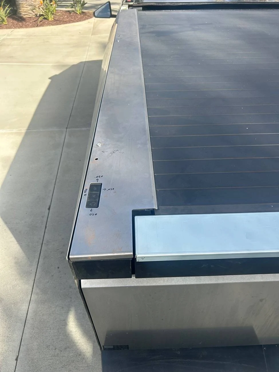 Tesla Cybertruck Stainless tailgate cap and sail panels IMG_5336