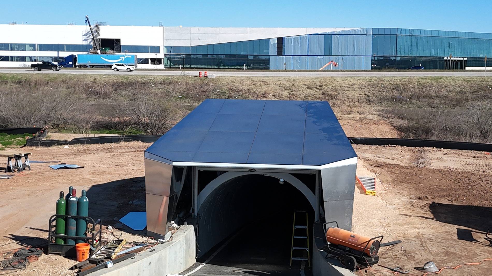 Tesla Cybertruck Birthing Tunnel (Cybertunnel) at Giga Texas gets steel exoskeleton GhsJI9nWUAAqFIM