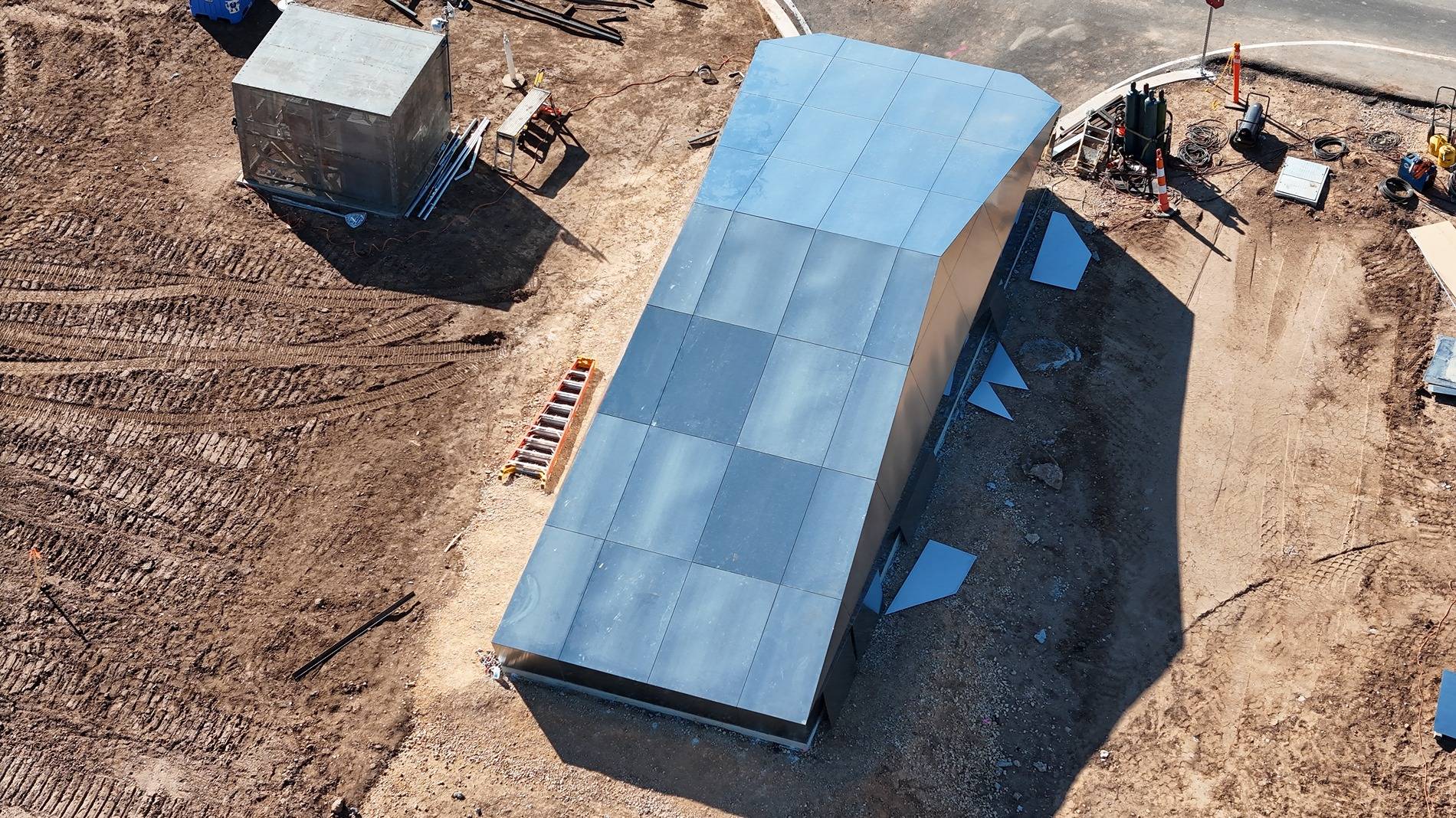 Tesla Cybertruck Birthing Tunnel (Cybertunnel) at Giga Texas gets steel exoskeleton GhsJI9cXUAATjg-