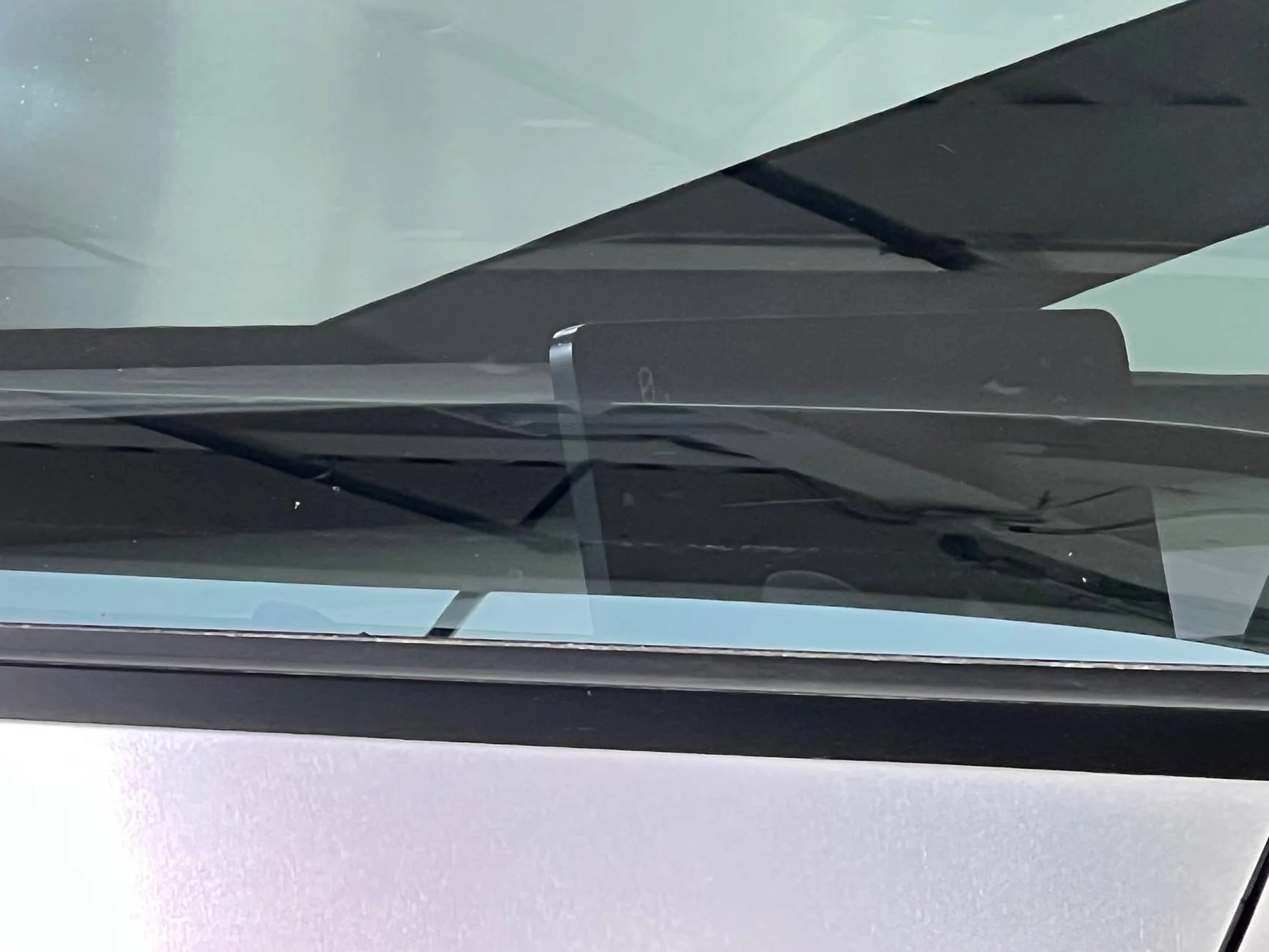 Tesla Cybertruck Brushed Metal Silver Edge on Screen IMG_0530