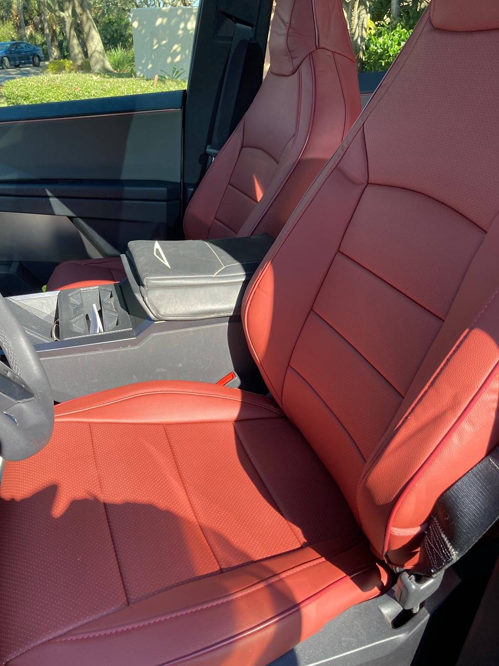 Tesla Cybertruck Red seat covers to add a little color and warmth IMG_2736