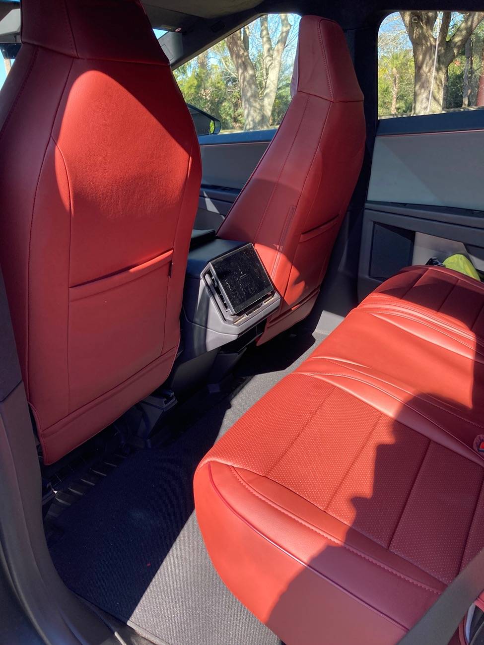 Tesla Cybertruck Red seat covers to add a little color and warmth IMG_2735