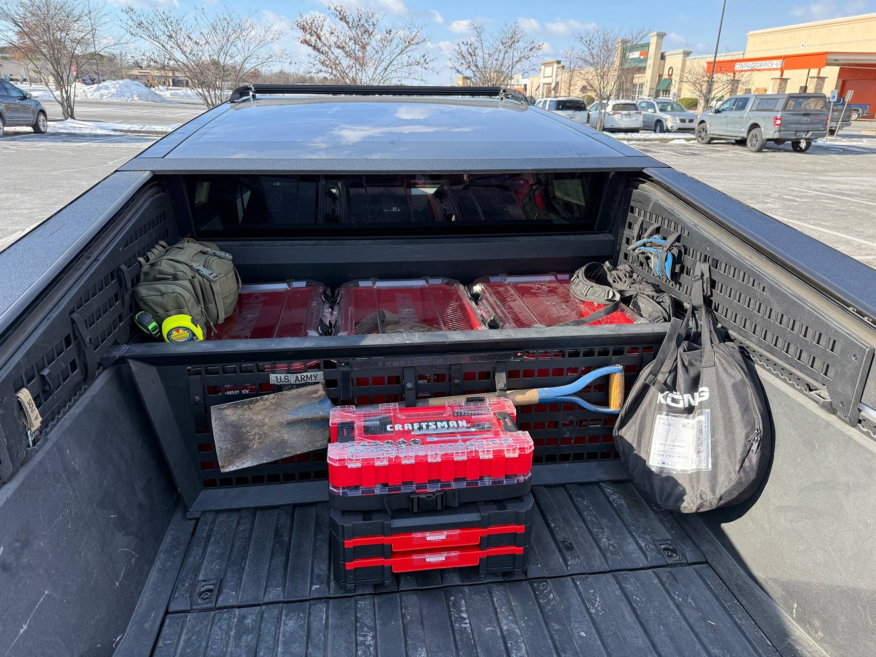 Tesla Cybertruck Husky Storage Containers fit nicely in Cybertruck bed IMG_1039