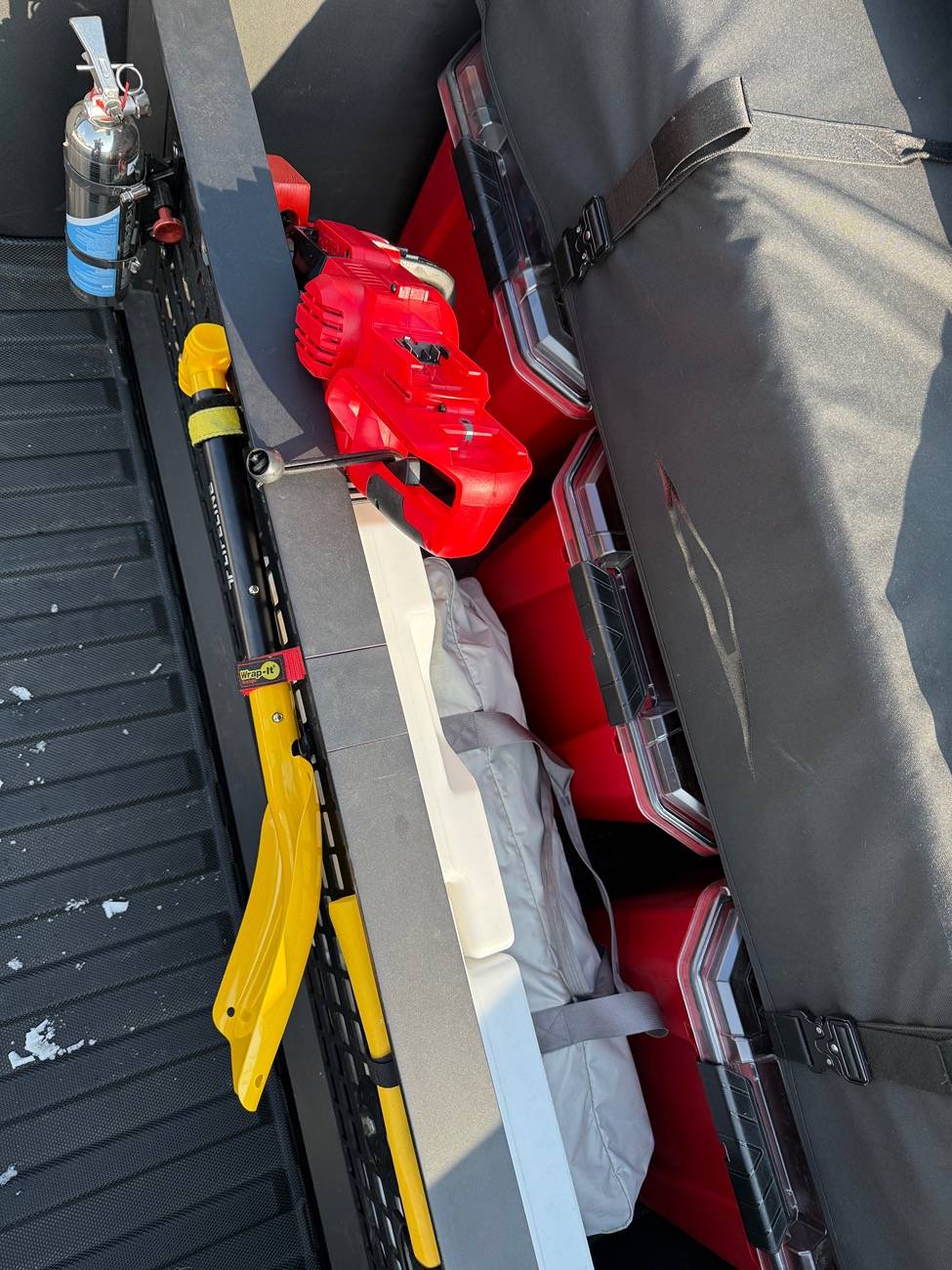 Tesla Cybertruck Chainsaw mount on cargo divider IMG_5541
