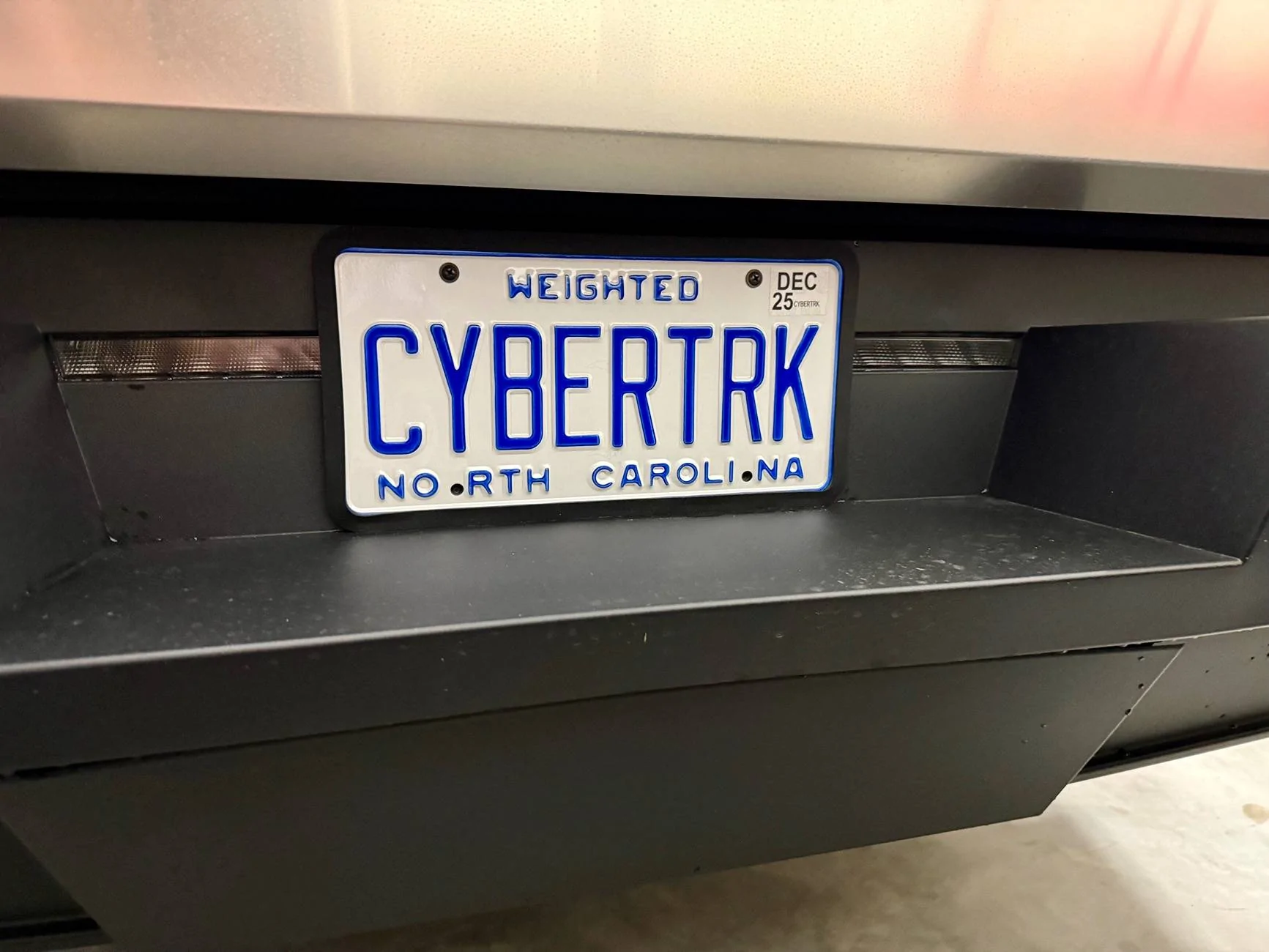 Tesla Cybertruck Custom license plate / vanity plate name for your Cybertruck? IMG_9420