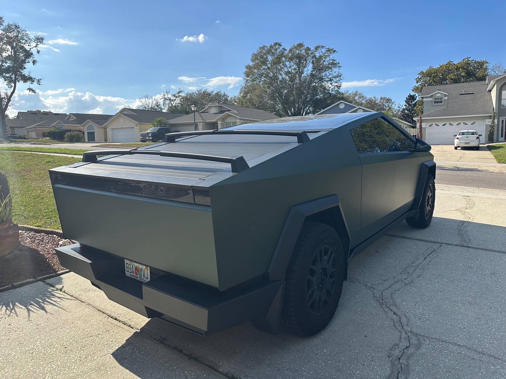 Tesla Cybertruck 3M Vinyl Pine Green Metallic Self Wrap Kit for Cybertruck from Tesbros Results! IMG_2940