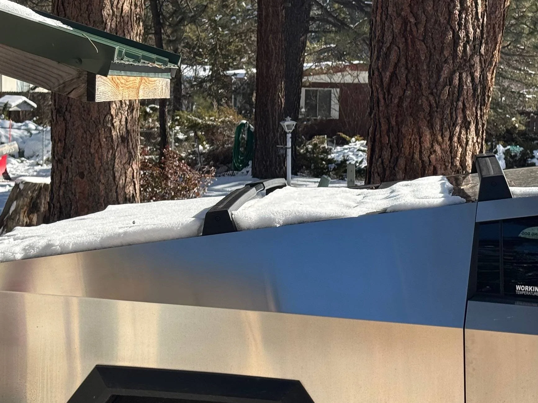 Tesla Cybertruck FROZEN VAULT COVER not opening IMG_1658