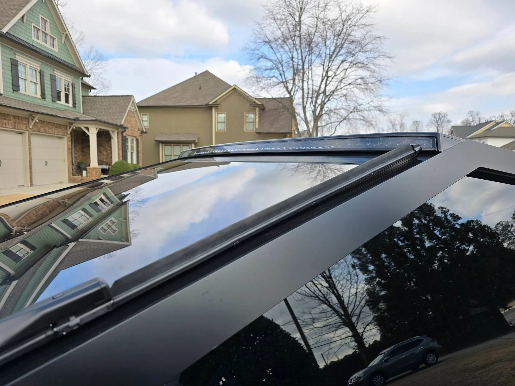 Tesla Cybertruck Getting cybertruck wrapped. Undecided on vinyl wrap / ppf. Leaning black but unsure of gloss, satin, or matte and which brand, need help! 20250205_115657