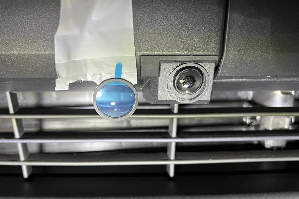 Tesla Cybertruck Forward camera took a hit from road debris... any lens protector available? front camera lens protector