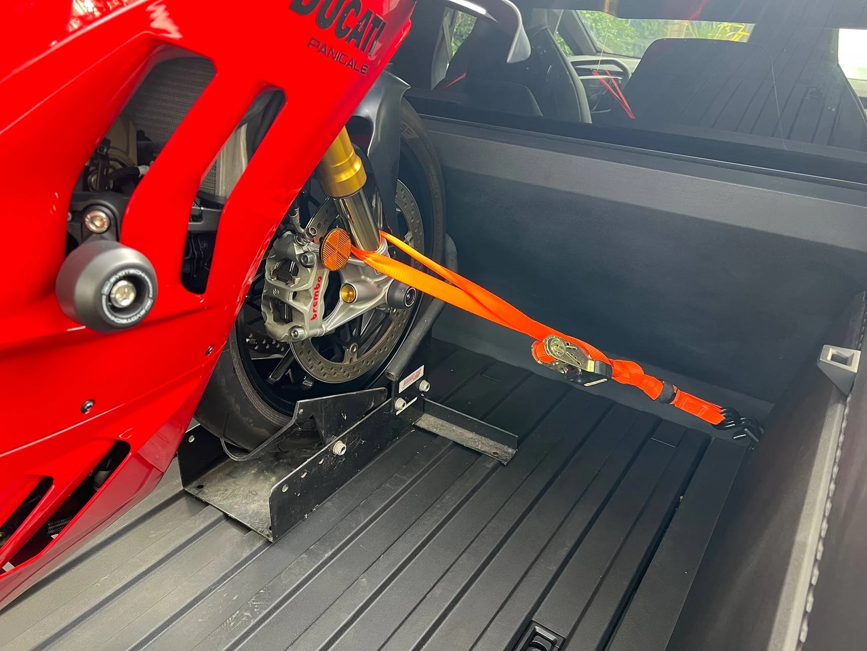 Tesla Cybertruck Ducati Panigale successfully loaded in CT! Post your motorcycles in bed IMG_8621