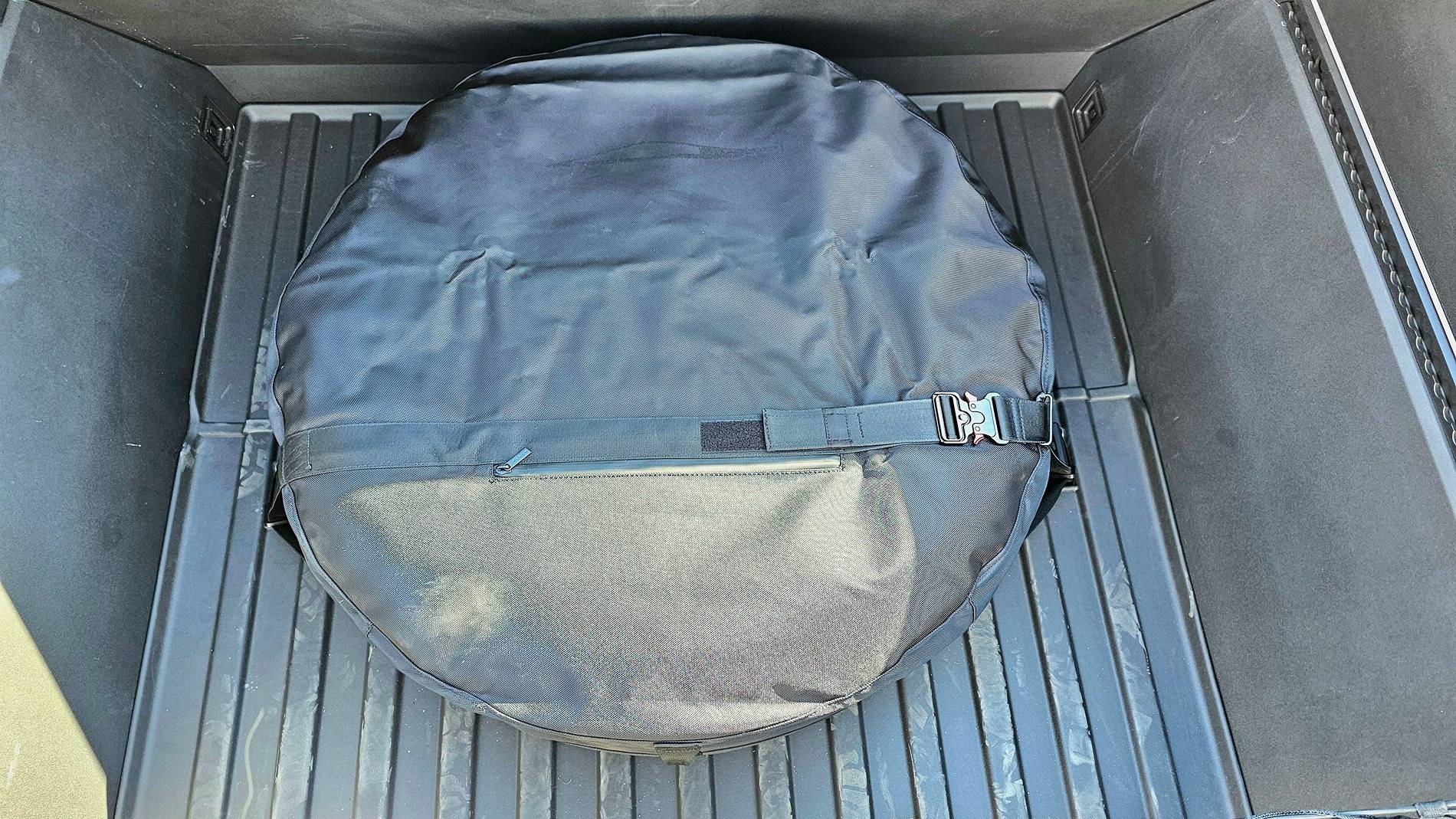 Tesla Cybertruck How I Carry a Spare When Off-road Adventuring -- Mounted to Underside of Bed Rack 20250228_151625
