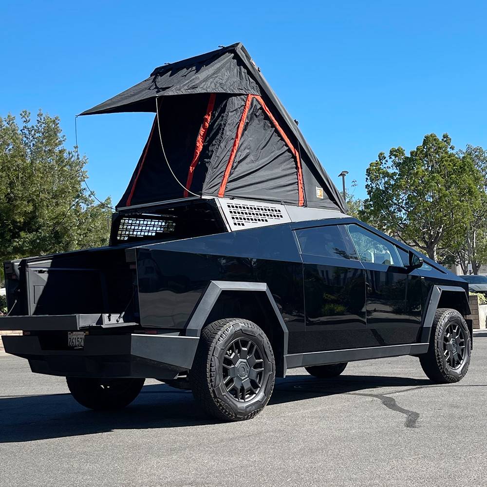 Tesla Cybertruck CYBERTRUCKco St. Patrick's Day Modular Racks and Crossbar Sale live now!-  SAVE 17% through the 17th! cybertruck-motorcycle-bed-rack-with-molle-panels-7
