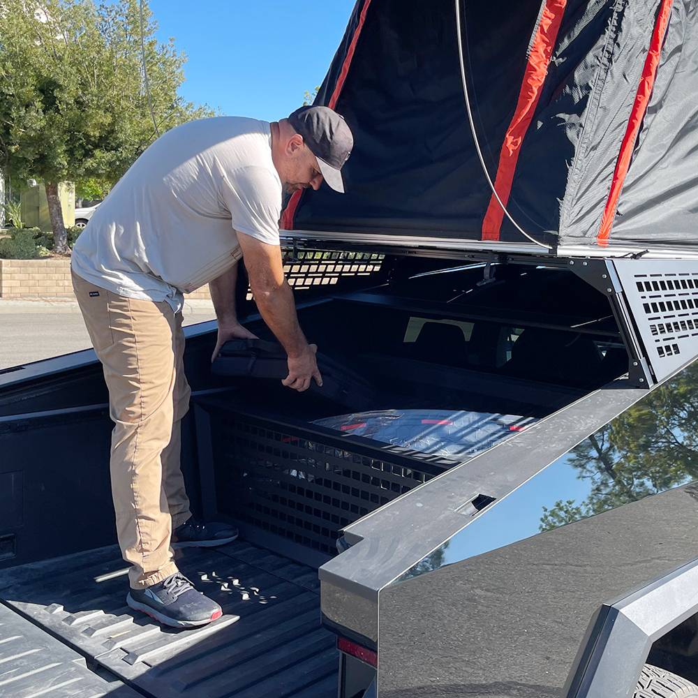 Tesla Cybertruck CYBERTRUCKco St. Patrick's Day Modular Racks and Crossbar Sale live now!-  SAVE 17% through the 17th! cybertruck-motorcycle-bed-rack-with-molle-panels-8