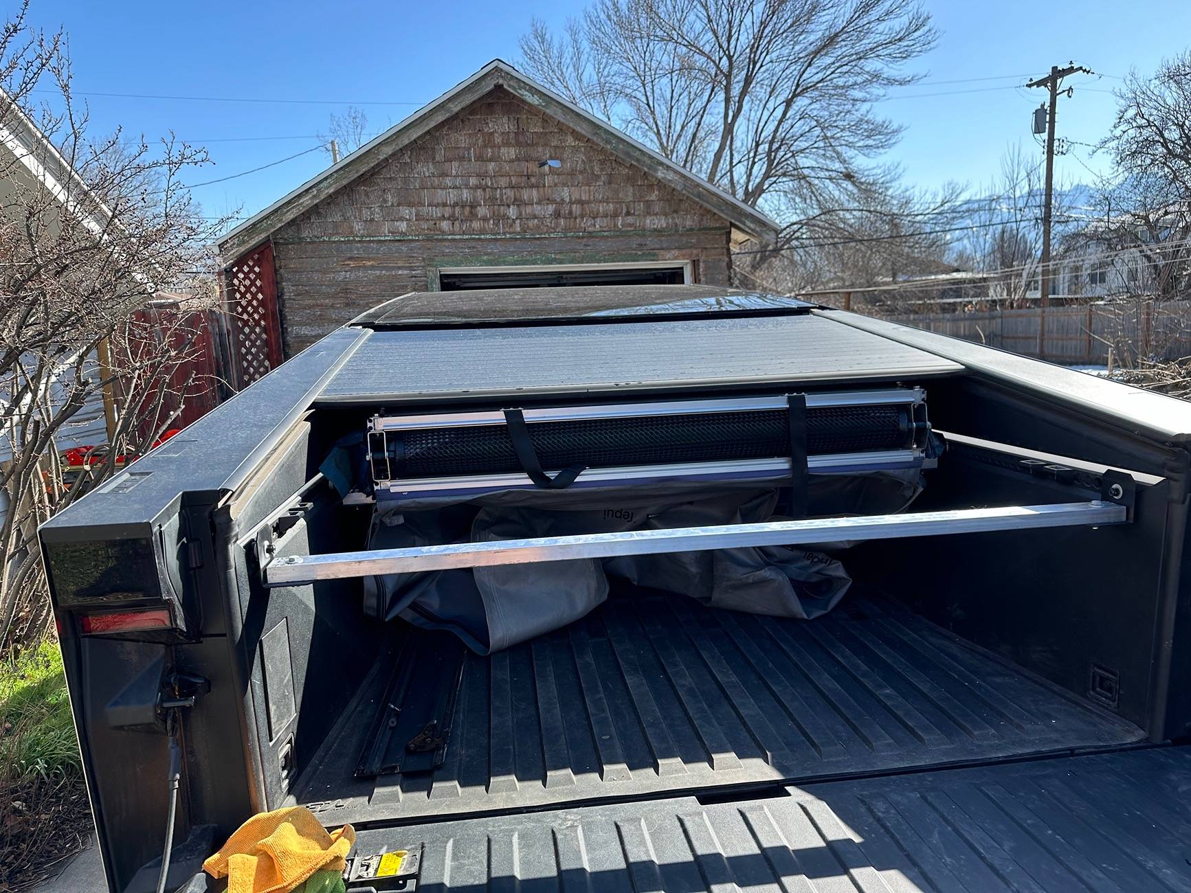 Tesla Cybertruck The elusive L track mounted roof top tent with fully closing tonneau IMG_1945