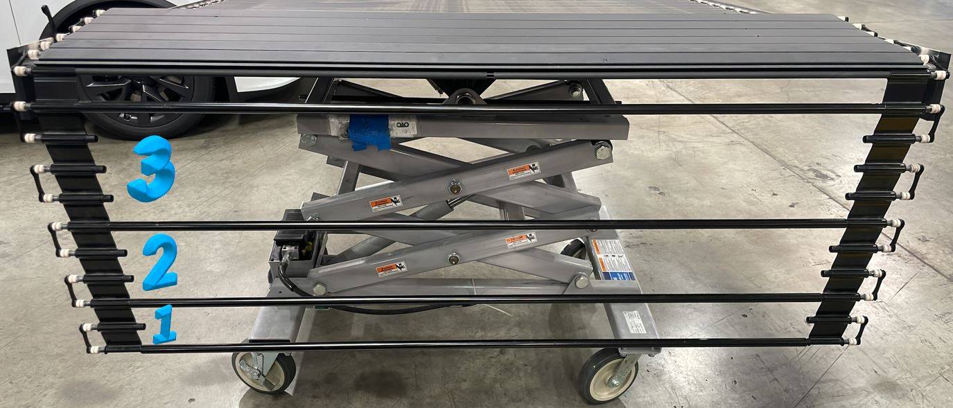 Tesla Cybertruck Remove crossbars for tonneau service ? GUID-C7863206-A791-4051-9F18-DB8D1E3D7F1A-online-en-US