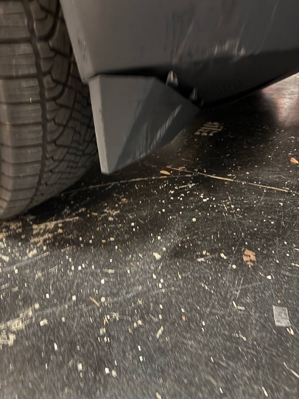 Tesla Cybertruck Tire hit CT busted front wheel fairing and plastic undercarriage IMG_7981