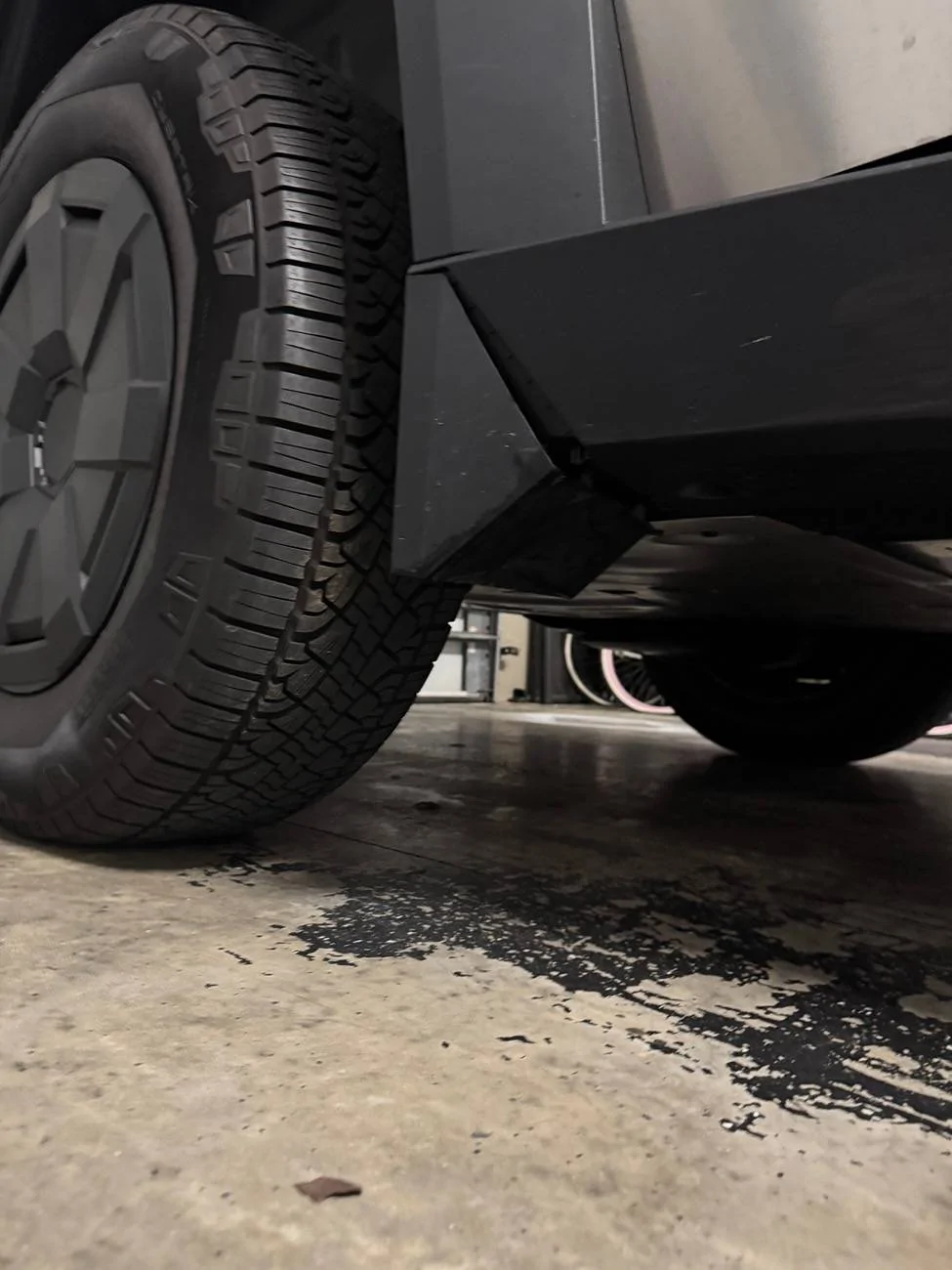 Tesla Cybertruck Tire hit CT busted front wheel fairing and plastic undercarriage IMG_7985