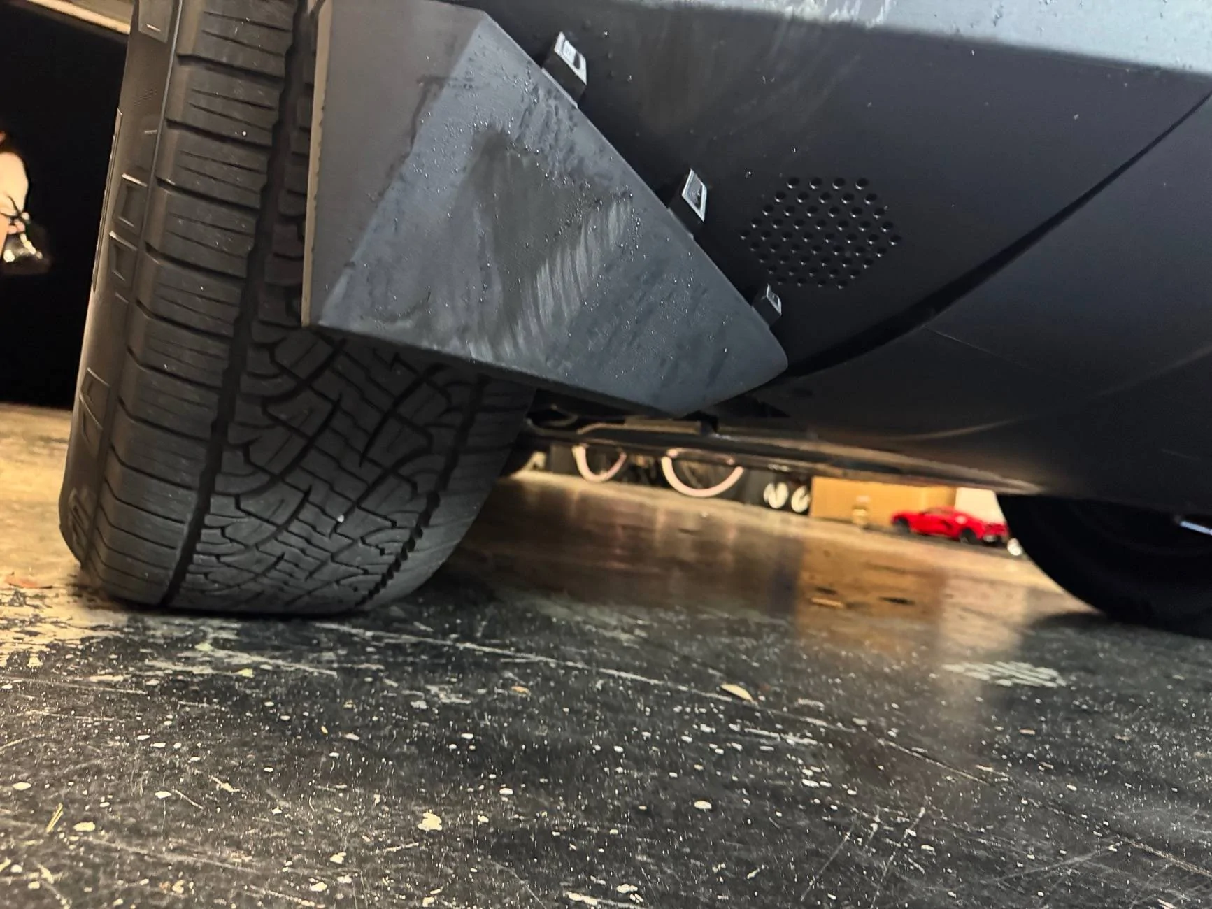 Tesla Cybertruck Tire hit CT busted front wheel fairing and plastic undercarriage IMG_7976